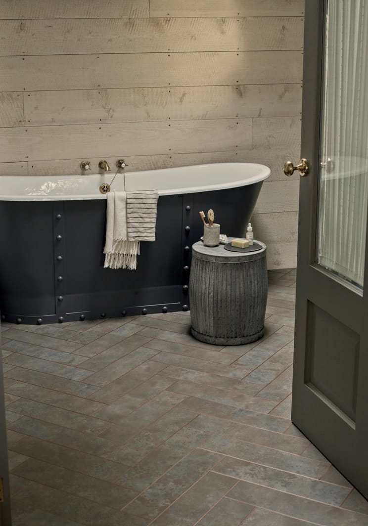Amtico Signature grey-oak herringbone in a bathroom