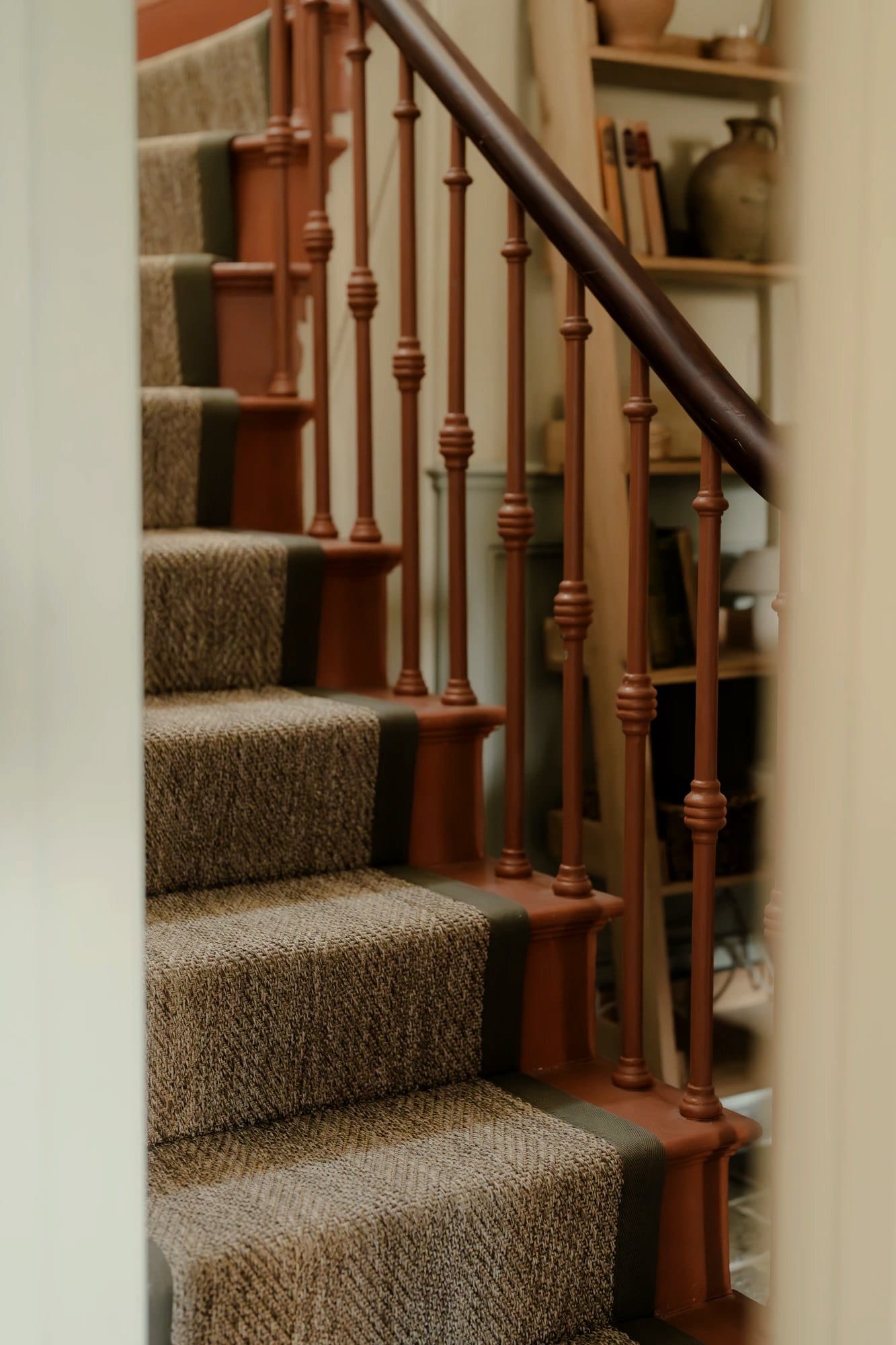 Woven flatweave stair runner with a dark border